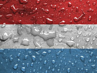 Flag of Luxembourg with rain drops
