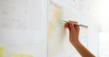 Writing, calendar and schedule with hands of person in office for to do list, planning and...