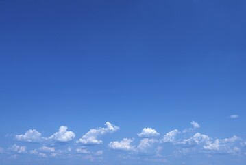 Fair weather clouds (Cumulus humilis) on the horizon, Bavaria, Germany, Europe