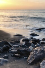 Black sandy beach with stones, Playa del Ingles at sunset, Valle Gran Rey, La Gomera, Canary Islands, Spain, Europe