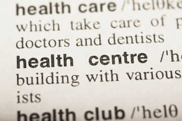 Obraz premium Health centre, text in dictionary. macro shot. selective focus