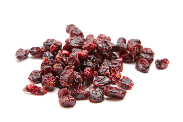 Scattered dried cranberries with vibrant red hues, glossy surfaces, and wrinkled textures, displayed on a clean white background