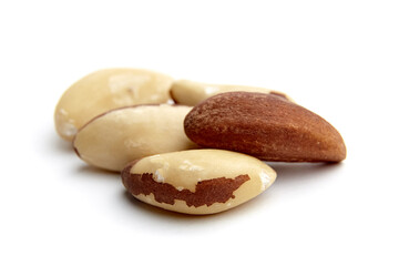 Close-up of Brazil nuts with natural brown and cream textures arranged on a clean white background, highlighting their smooth, nutritious appeal