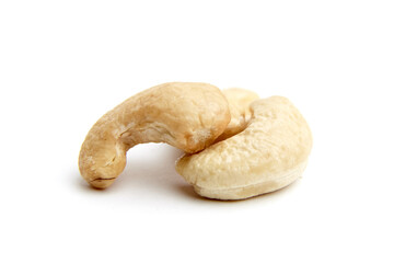 Two raw cashew nuts showcasing their natural curves and textured surface, isolated on a white background. Perfect for health and food concepts
