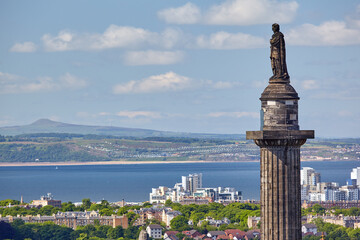 The view of top of Melville Monument on the Firth of Forth background. Edinburgh, Scotland
