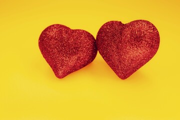 Two hearts shape on the yellow background