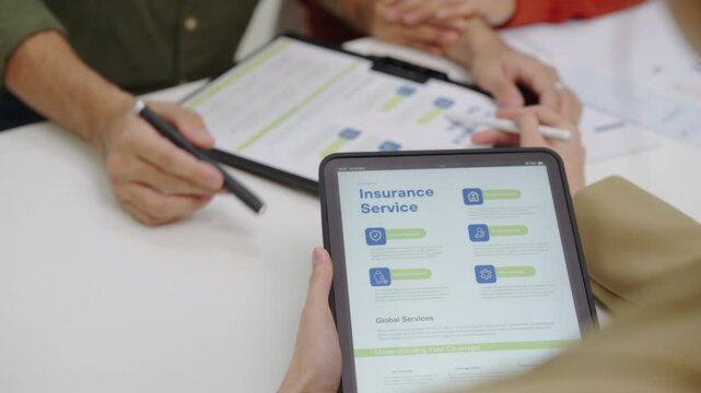 Asian financial consultant explaining investment insurance to  couple using a laptop at home.financial planning for future goals.