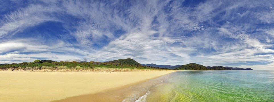 Gold Yellow sandy beach of Awaroa Bay, Abel Tasman National Park, Tasman Region, Southland, New Zealand, Oceania
