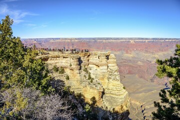 View to Mather Point with visitors, tourists, eroded rocky landscape, South Rim, Grand Canyon...