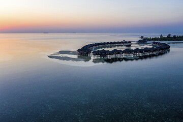 Aerial view, lagoon of the Maldives island Olhuveli with water bungalows, South-Male-Atoll,...
