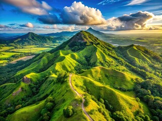 Naklejka premium Batulao Mountain's breathtaking volcanic landscape offers stunning drone photography opportunities, explored via challenging hiking trails.