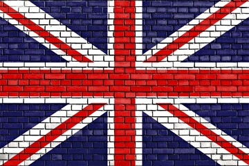 Fototapeta premium Flag of UK painted on brick wall
