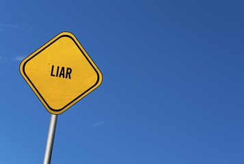 Liar, yellow sign with blue sky