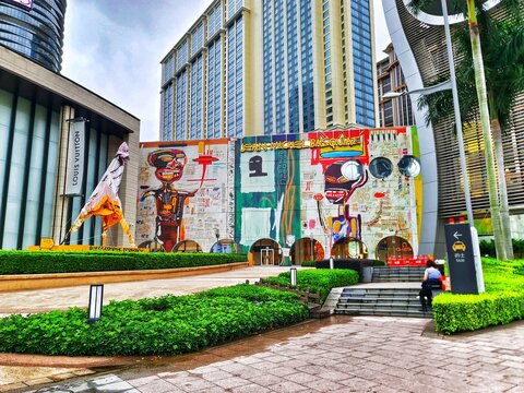 Taipa, Macau on 14 Nov 2024. Urban Basquiat Mural: Vibrant Neo-Expressionist Art in Modern Cityscape