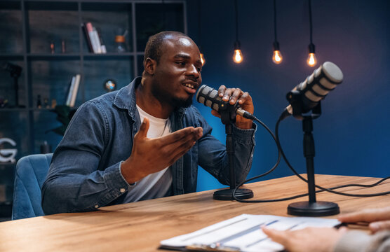 Black man is doing podcast in the studio