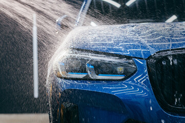 Close up water is running down the hood