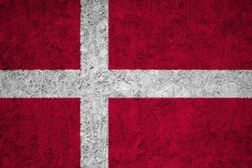 Fototapeta premium Denmark Flag painted on the cracked grunge concrete wall