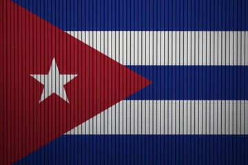 Cuba Flag painted on the cracked grunge concrete wall