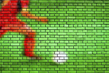 Soccer background painted on a brick wall