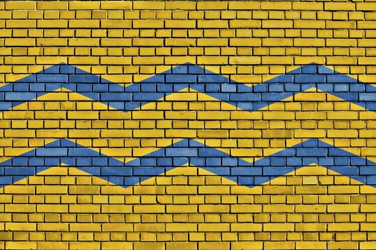Flag of Manchukuo Marine Transport painted on brick wall