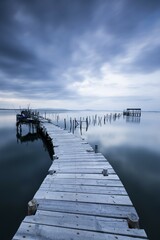 Naklejka premium Landing stage in the calm sea, evening mood, Carrasqueira, Alcacer do sal, Portugal, Europe