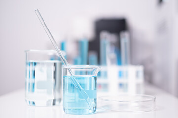 Laboratory beaker blue liquid chemistry chemical research science medical equipment