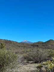 Santiago del Teide landscape on a sunny winter day, volcano Teide in the background