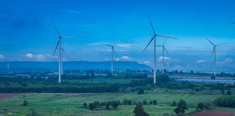 The wind turbines generating electricity with blue sky - Alternative renewable energy concept © SASITHORN
