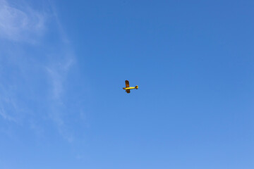 Superlight private plane flies in the sky