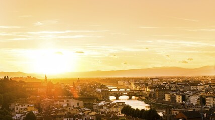 Obraz premium Panoramic view of city at sunset from Michelangelo Square, Piazzale Michelangelo, with Ponte Vecchio and Arno River, Florence, Tuscany, Italy, Europe