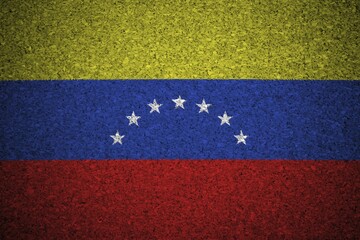 The Venezuelan flag painted on a cork board