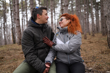 A couple smiling at each other on a Valentine's Day.