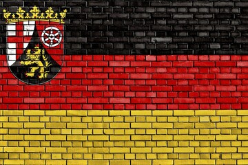 Flag of Rhineland Palatinate painted on brick wall