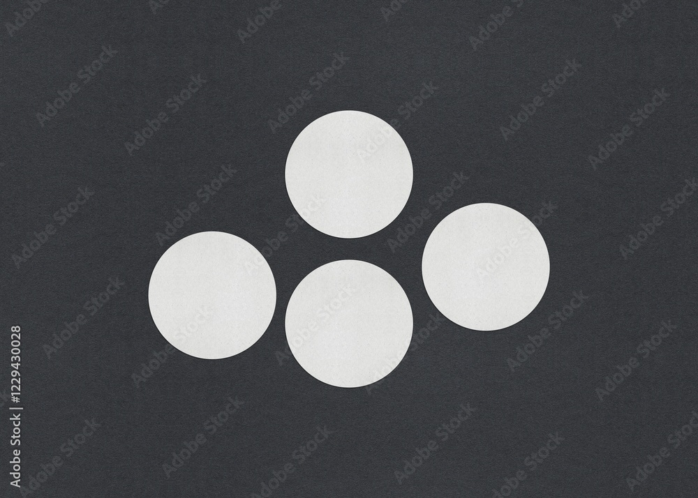 Poster four white circles arranged in a triangular formation on a dark gray background, blank white busines