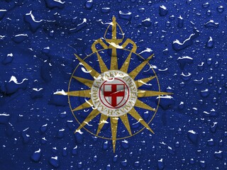 Flag of Anglican Communion with rain drops