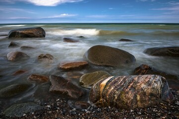 Stones, colored boulder on the beach, Baltic Sea, Jasmund National Park, Jasmund peninsula, Rügen...