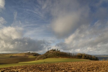 Fototapeta premium Maegdeberg Castle with cumulus Clouds in the background, Baden Wuerttemberg Germany