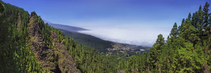 Fototapeta premium Trade wind clouds in the Orotava Valley and above the town of Orotava, Tenerife, Canary Islands, Spain, Europe