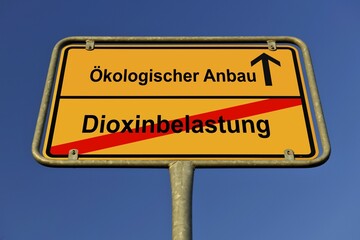 City limit sign, symbolic image for the way from Dioxinbelastung to Oekologischer Anbau, German for going from dioxin contamination to organic agriculture