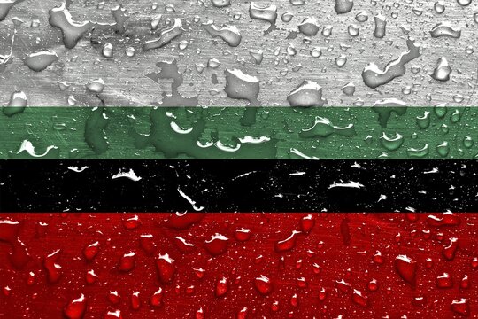 Flag of Dabrowa Gornicza with rain drops