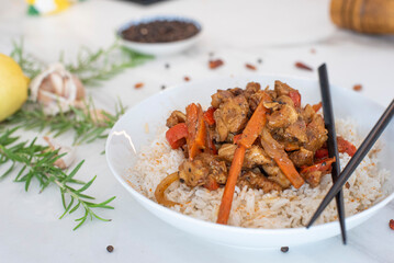 food plate of cooked rice fusion thai style and mediterranean rosemary