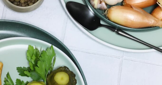 Pattypan squash appetizer preparation with herbs and spices