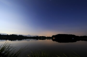 Fototapeta premium Mountain lake at twilight, Fuessen, Bavaria, Germany, Europe