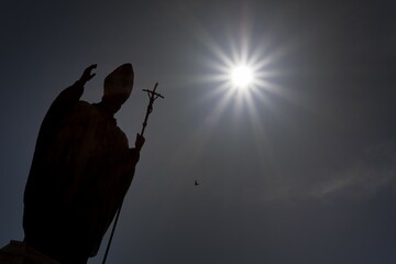 Silhouette of a statue in front of the church in Jerez de la Frontera, Andalusia, Spain, Europe