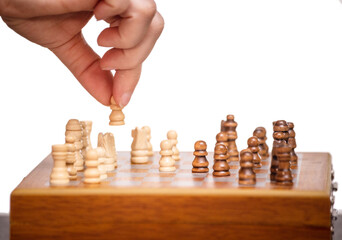 chess pieces on a chessboard on a light background.