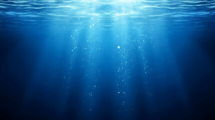 Underwater Scene Depicts Light Rays Penetrating Deep Blue Ocean Depths with Rising Bubbles Gently.
