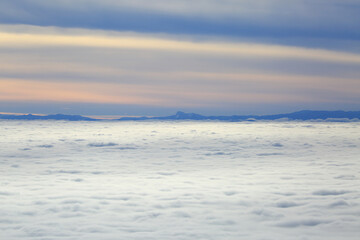 Foggy landscape from above, winter weather inversion