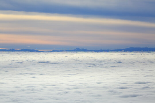 Foggy landscape from above, winter weather inversion