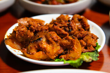 roasted port seasoned with spicy sauce
