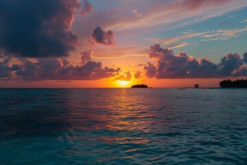 Stunning sunset paints the sky with vibrant colors over a tranquil ocean, featuring a picturesque island and a charming wooden pier